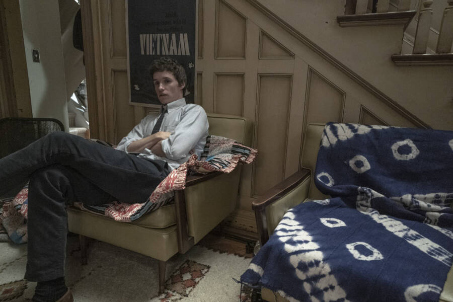 Eddie Redmayne As Tom Hayden