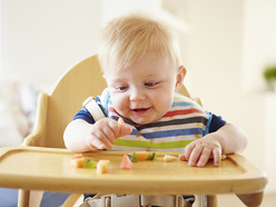 Older baby eating finger food