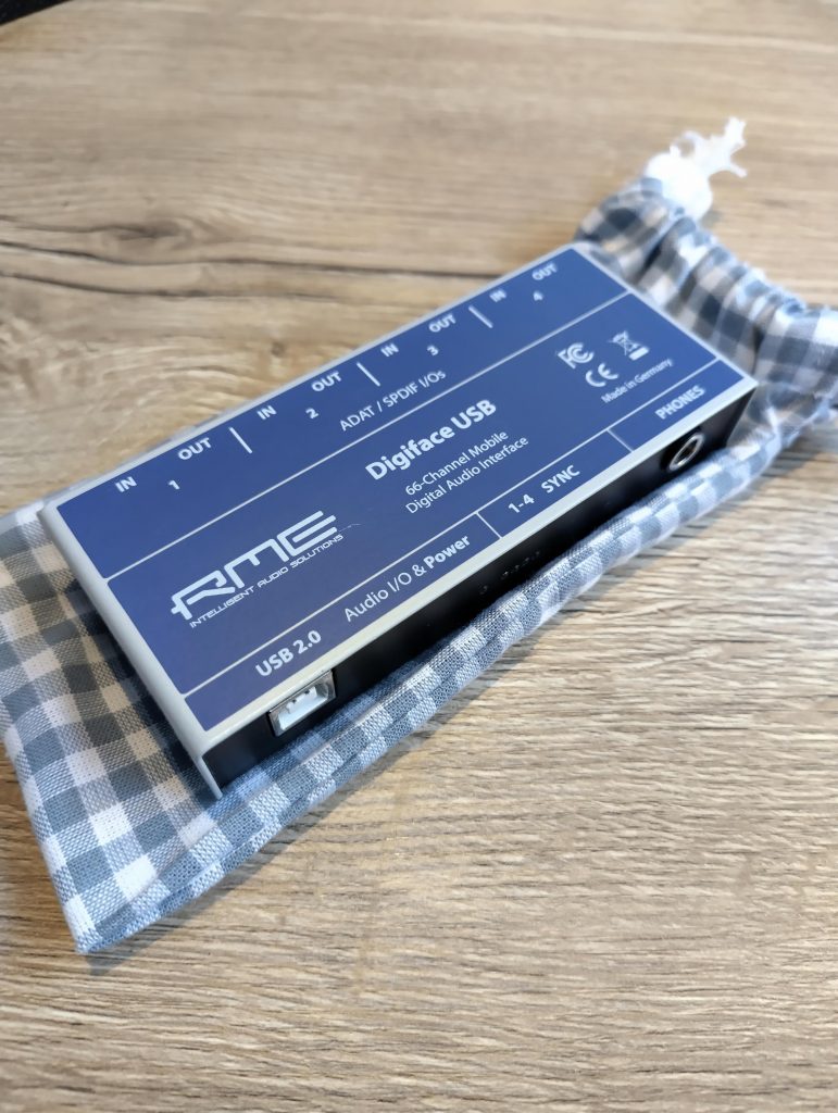 RME Digiface USB on top of its custom cotton pouch