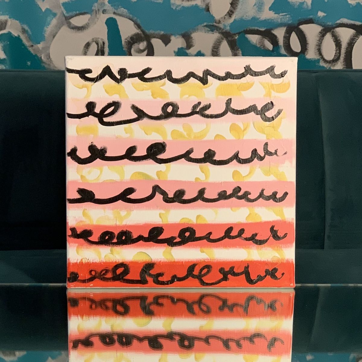 Abstract 12x12 painting with ombré peach and coral stripes, yellow background, and handwritten black script titled Receive by artist Beth Inglish.