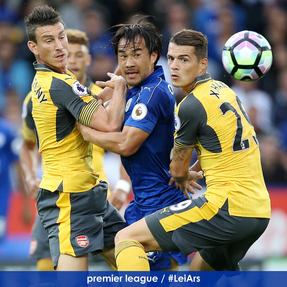 Shinji Okazaki is closely shackled by the @Arsenal defence Goalless after half an hour