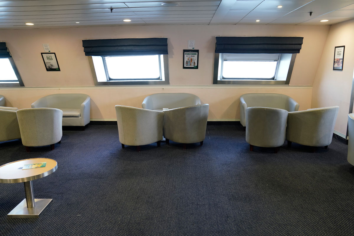 Seats and benches at the front of the ship.