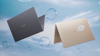The Iceland Gray and the Zabriskie Beige ASUS Zenbook A16 laptops floating in the air near bubbles.