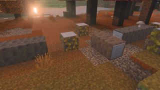Close-up of Poplar wood logs and blocks placed on the forest floor within Minecraft's new Dappled Forest biome.