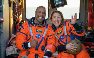 NASA astronaut Victor Glover, Artemis II pilot, left, and NASA astronaut Christina Koch, Artemis II mission specialist.