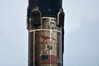 SpaceX's most flown Falcon 9 rocket, the 10-time flier B1051, arrives in Port Canaveral, Florida on May 12, 2021 after launching 60 Starlink satellites into orbit from Cape Canaveral Space Force Station on May 9.