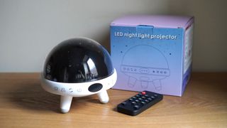 A YACHANCE Night Light Star Projector, with box and remote.