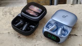 The Soundcore Liberty 5 Pro and 5 Pro Max, with their lids open and buds shown.