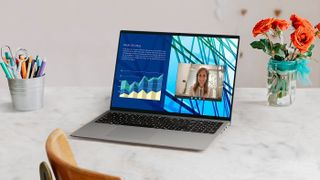A lifestyle image of the Dell Vostro 16 in use.