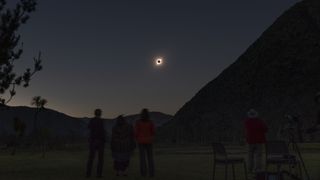 People watch the total solar eclipse from El Molle, Chile, on July 2, 2019. - Tens of thousands of tourists braced Tuesday for a rare total solar eclipse that was expected to turn day into night along a large swath of Latin America's southern cone, including much of Chile and Argentina.