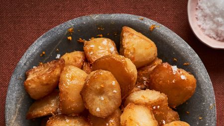 Bowl of crispy roast potatoes