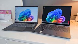 HP OmniBook X and Lenovo IdeaPad 5X 2-in-1 on a hotel table.