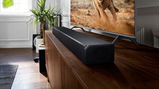 A photo of the Samsung HW-N950 Soundbar in a living room