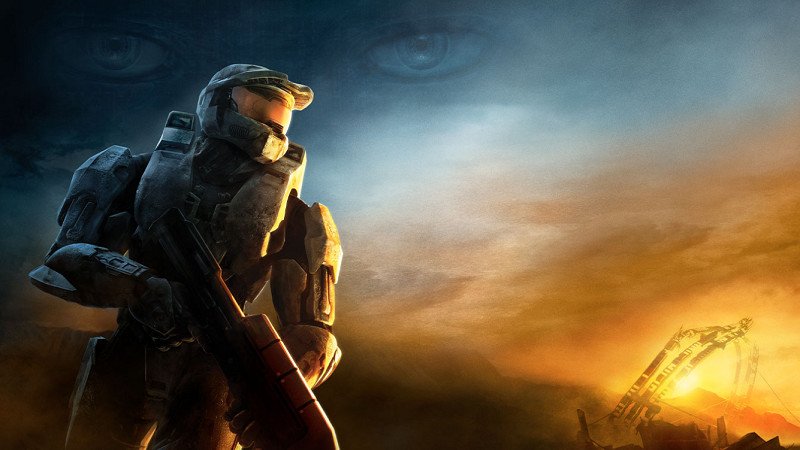 Master Chief from Halo 3 holding an assault rifle stands in a dramatic, smoky landscape; cortana's eyes appear faintly in the sky above.