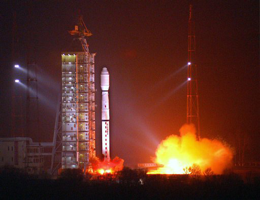 In this photo released by China's Xinhua News Agency, a Long March-4C carrier rocket carrying China's remote sensing satellite Yaogan III blasts off from the Taiyuan Satellite Launch Center in Taiyuan, capital of north China's Shanxi Province, early Monday, Nov. 12, 2007. The 2,700-kilogram satellite will be used for scientific research, land resources surveying, crop yield estimate and disaster prevention and relief.