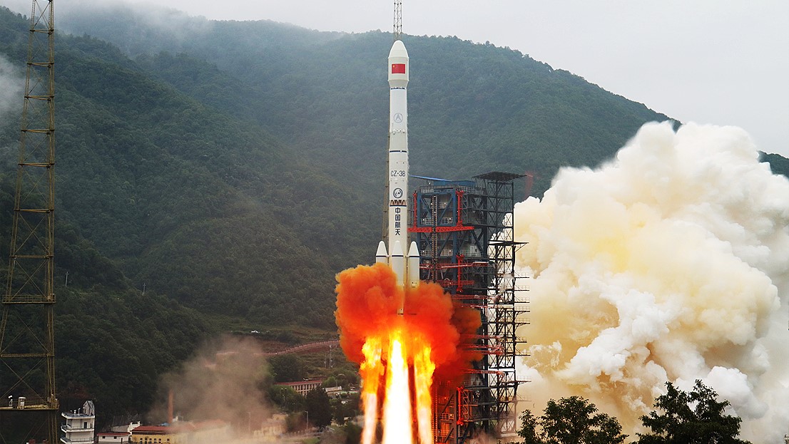 A Chinese Long March 3B rocket launches the military space debris mitigation satellite Shijian-21from the Xichang Satellite Launch Center on Oct. 24, 2021.