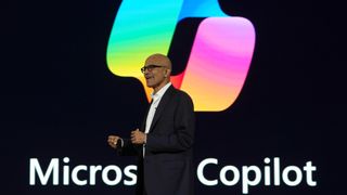 Microsoft CEO Satya Nadella on a Microsoft Copilot background