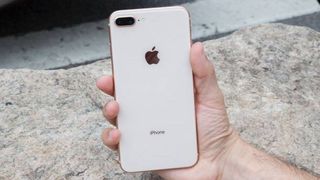 iPhone 8 Plus in hand