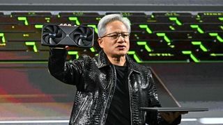 Nvidia CEO Jensen Huang holds a Blackwell GeForce RTX 50 Series GPU (L) and a RTX 5000 laptop as he delivers a keynote address at the Consumer Electronics Show (CES) in Las Vegas, Nevada on January 6, 2025.
