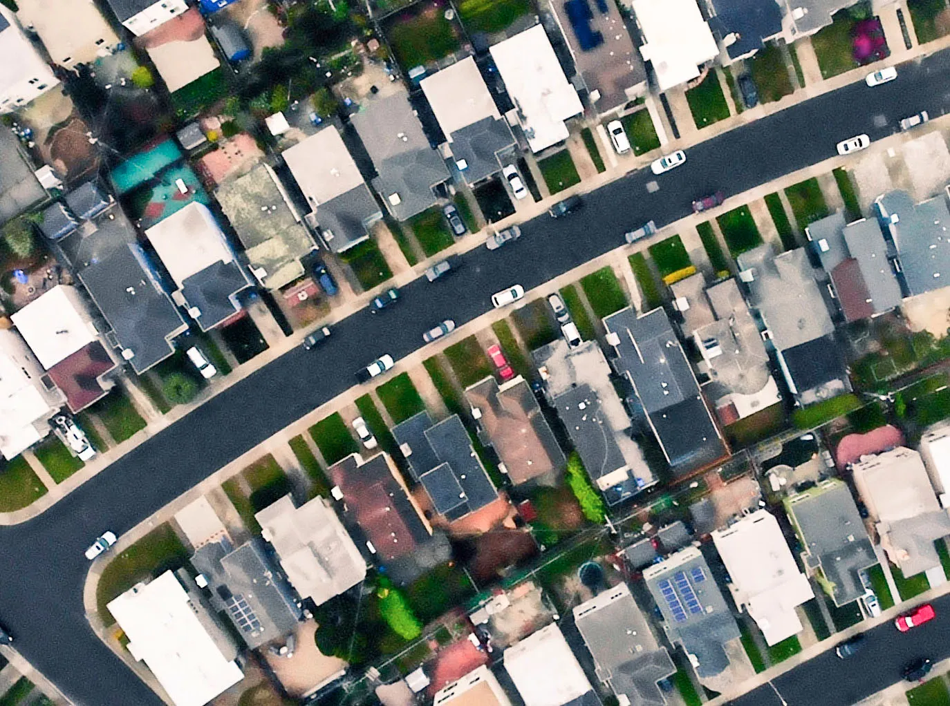 an aerial view of a neighborhood with lots of houses.