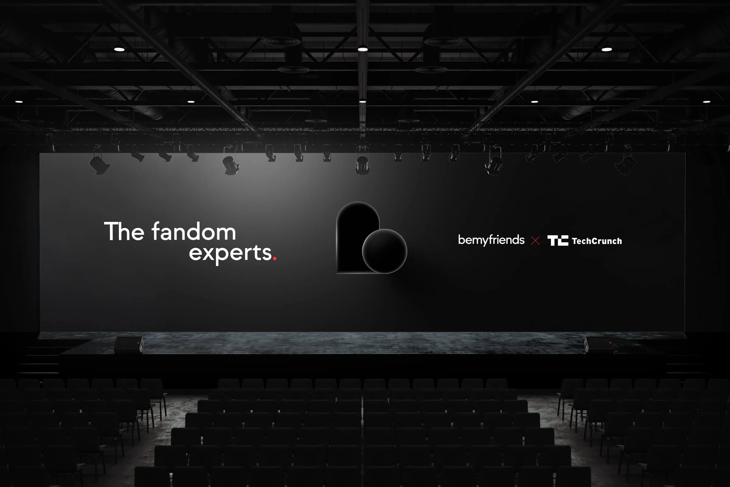 Stage set up for a Bemyfriends conference with on screen graphics
