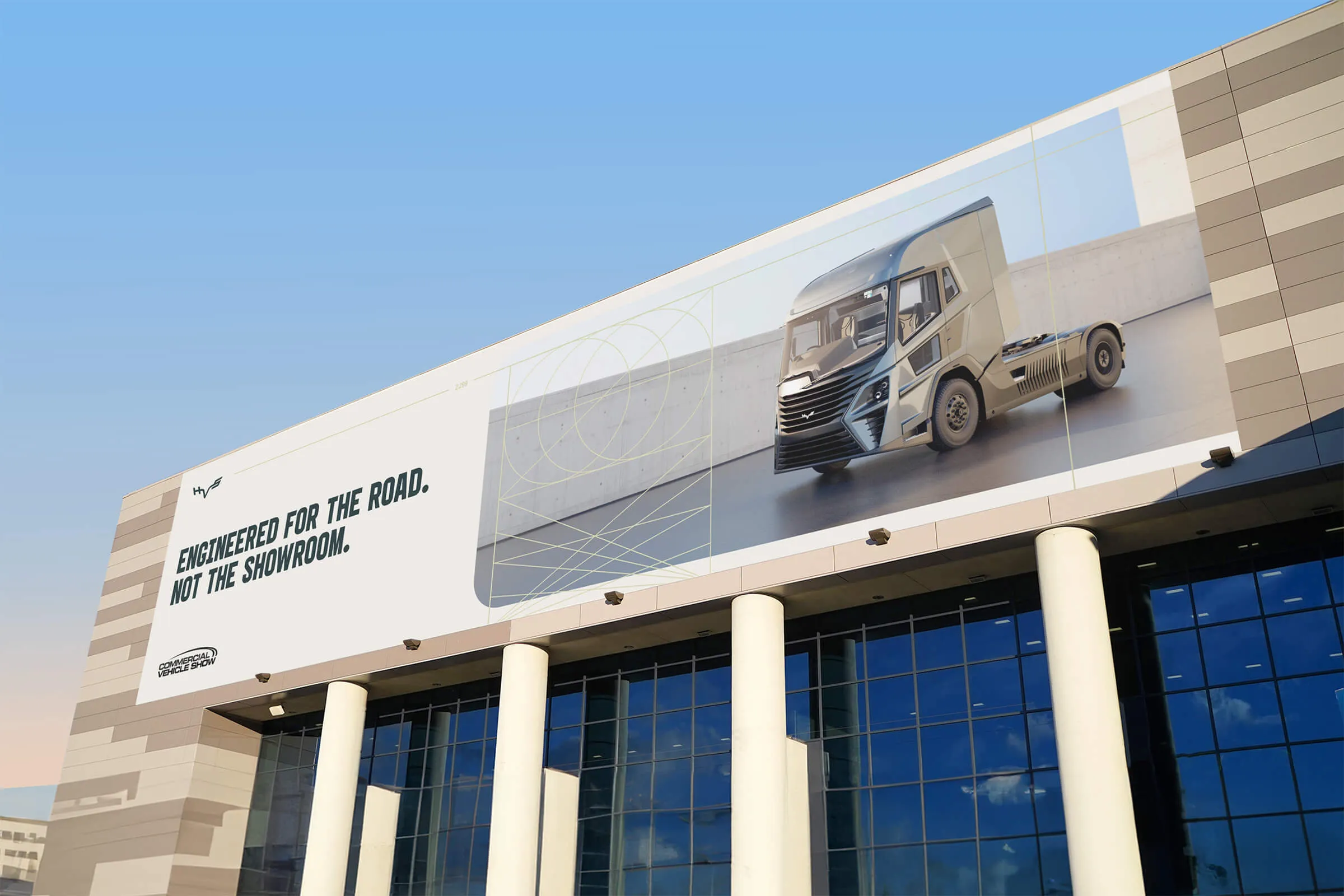 Event banner outside a conference centre featuring an image of the truck and the headline 'Engineered for the road, not the showroom'