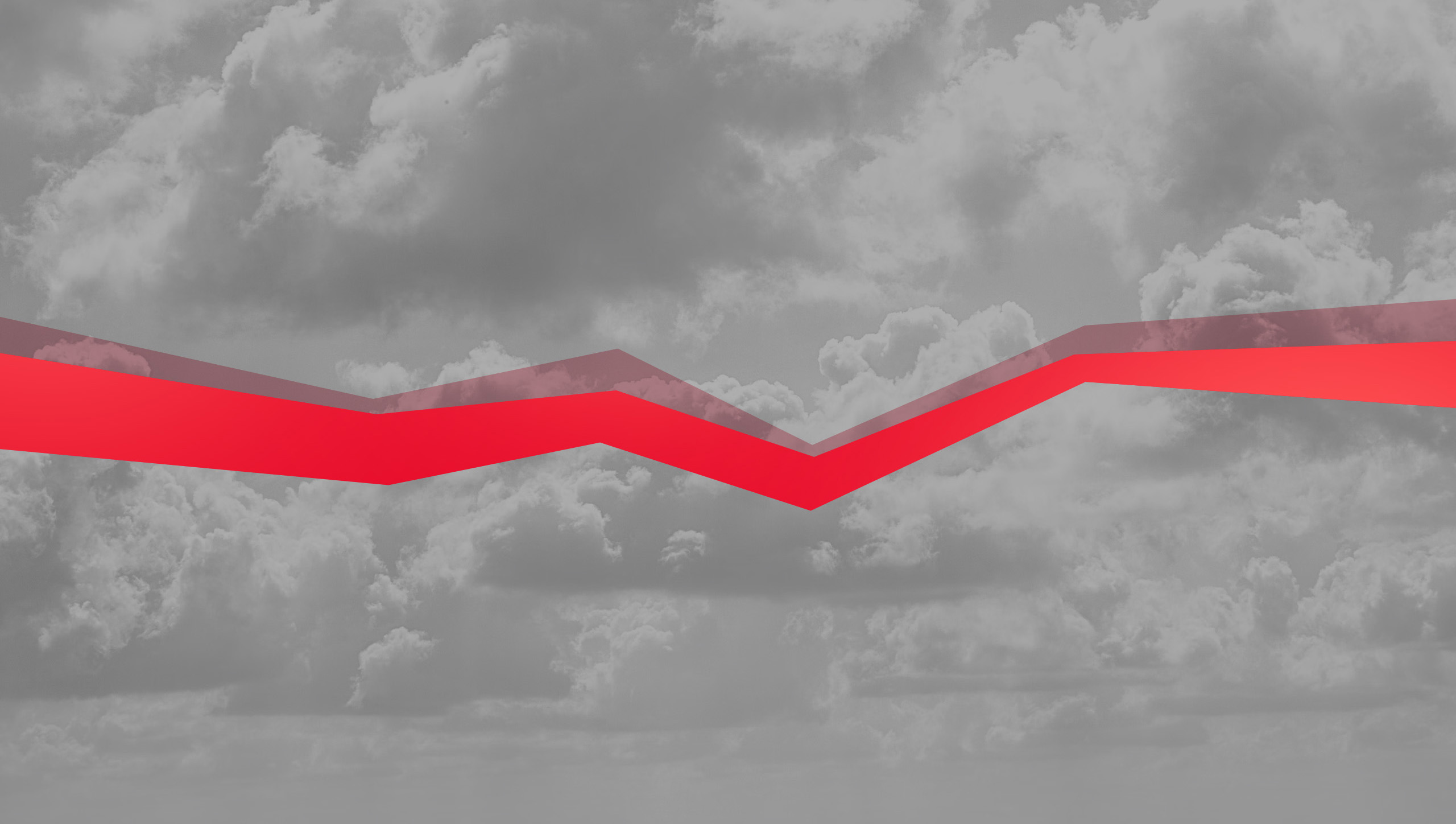 Roter Streifen vor grauen Wolken.