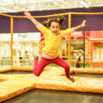 image of a child jumping on a trampoline in trampoline parks in ct.