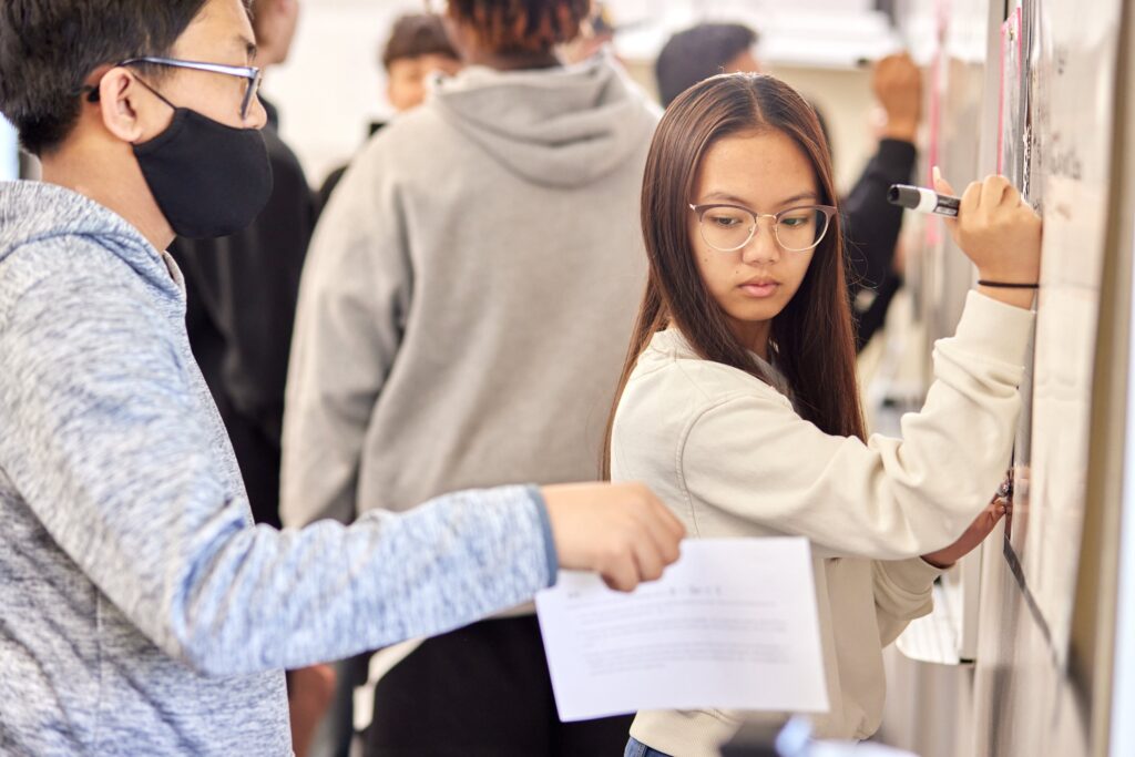 Students at the whiteboard