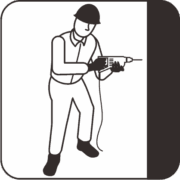 ドリルを使う工事作業員 ドリルを使う工事作業員