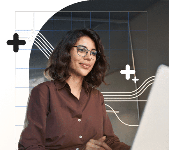 A smiling young woman with dark hair and glasses, wearing a brown shirt, is working on a laptop, with a stylized background featuring graphs and abstract lines.