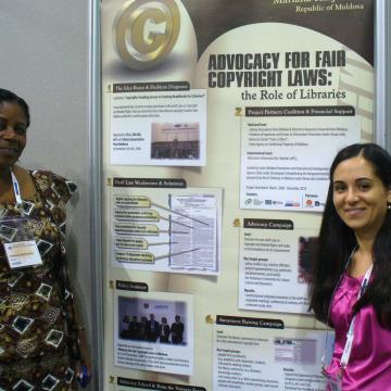 Photo of EIFL copyright librarians from Ghana and Moldova at a poster session at IFLA. The poster is entitled 'Advocacy for access to knowledge, the role of libaries'. Photo of EIFL copyright librarians from Ghana and Moldova at a poster session at IFLA. The poster is entitled 'Advocacy for access to knowledge, the role of libaries'.