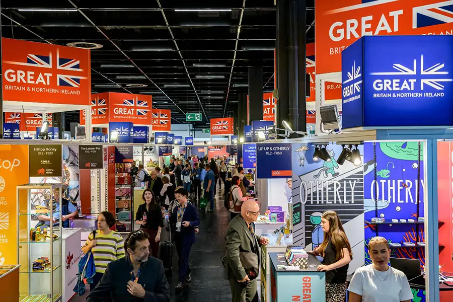 Trade center exhibition with businesses presenting their services to other companies.