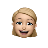 A cartoon-style emoji of a smiling blonde person with blue eyes and a cheerful expression.