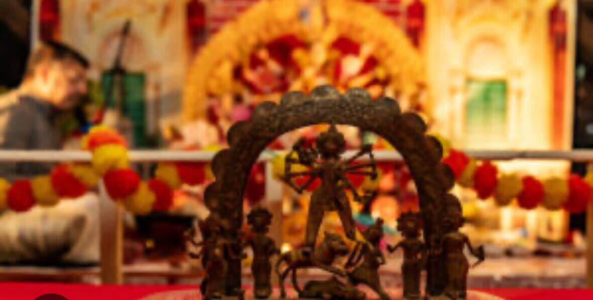 People merrymaking in an original cover at Boston Durga Bari.