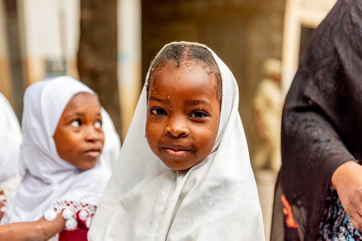 Pictured: Firdaus standing with classmates. Marian Siljeholm/USAID Jifunze Uelewe (Learn and Understand) project