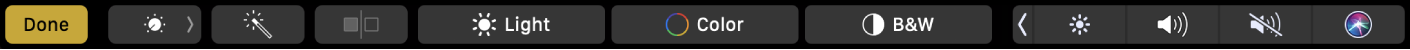 The Touch Bar showing buttons for editing photos—crop, filters, adjust, and retouch, and the button to navigate to more options.
