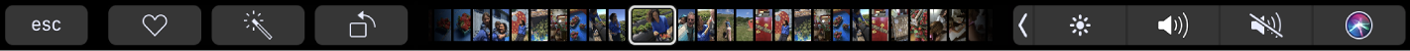 Touch Bar Photos avec les boutons Favoris, Faire pivoter et Modifier, et le défileur de photos.