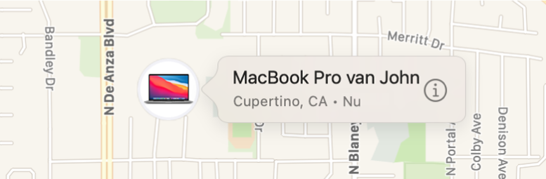 Een close-up van het infosymbool van Johns MacBook Pro.