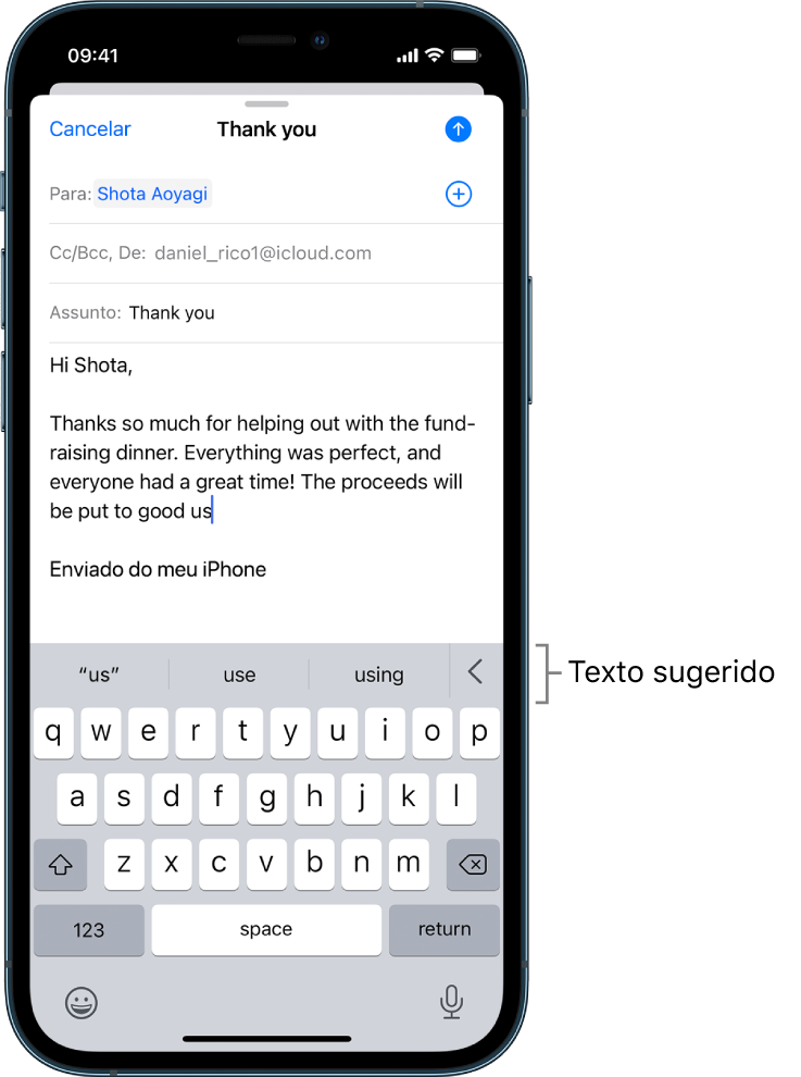 Uma mensagem do Mail a mostrar um e-mail a ser editado, com sugestões para completar a palavra seguinte.