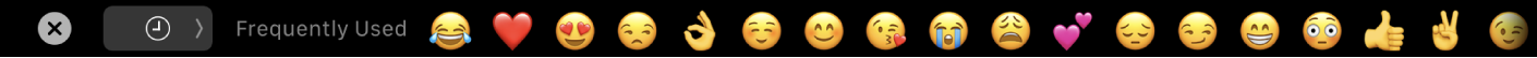 The Touch Bar displaying the emoji picker.