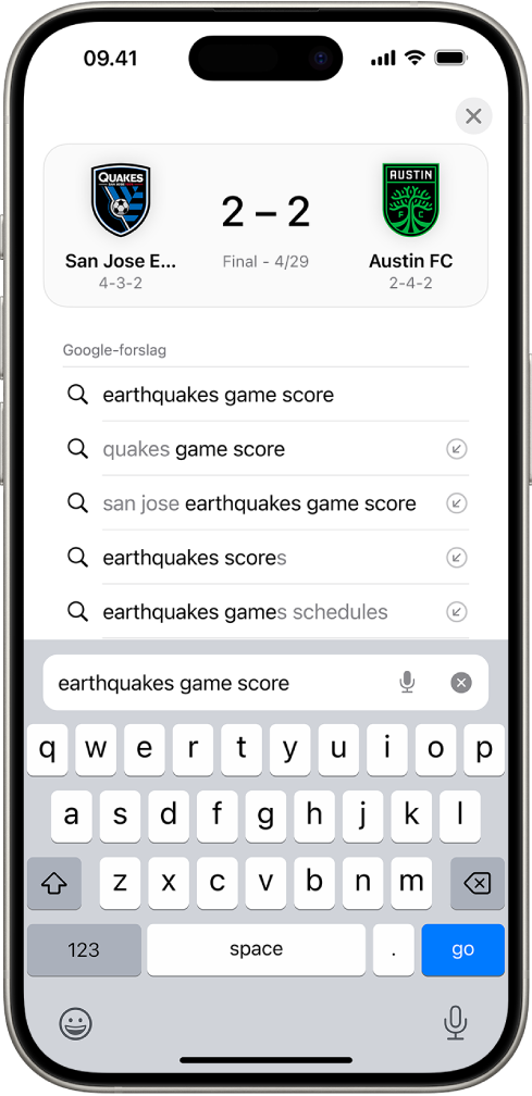 En søgeskærm i Safari med skærmtastaturet nederst på skærmen. Over tastaturet indeholder søgefeltet teksten “earthquakes game score”.