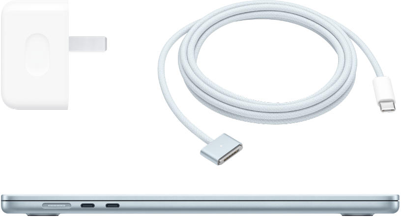 Tampilan samping MacBook Air dengan adaptor daya dan kabel pengisian daya.