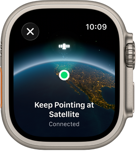 Näyttö, jossa näkyy satelliittikuvake kaarevan maapallonäkymän päällä, vihreä yhteyden osoitin ja teksti ”Jatka kohdistamista satelliittiin”.