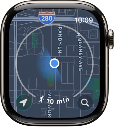 L’app Plans avec un cercle autour de la position actuelle. Le rayon représente une marche de sept minutes. Un bouton Lieu se trouve en bas à gauche et un bouton Rechercher est en bas à droite.