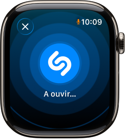 Um ecrã a mostrar o título e o intérprete de uma música identificada pela aplicação Reconhecimento de música. O botão de reprodução está na parte inferior direita.