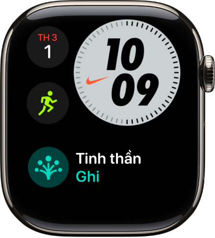 Mặt đồng hồ Nike thu gọn đang hiển thị thứ và ngày ở trên cùng bên trái, giờ ở trên cùng bên phải, tổ hợp Bài tập ở giữa bên trái và tổ hợp Hẹn giờ.