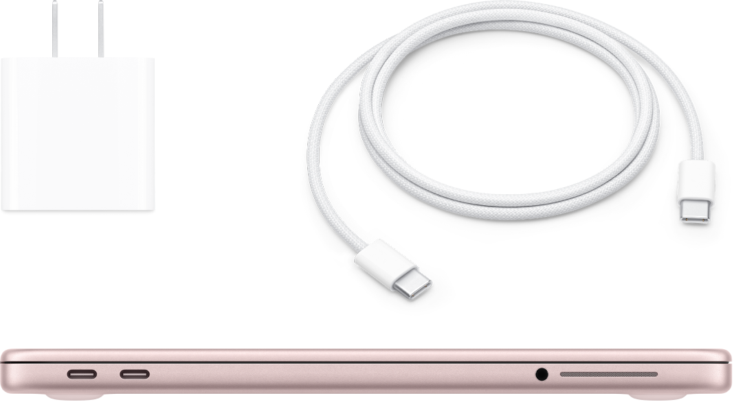 Una MacBook Neo con un adaptador de corriente y un cable.