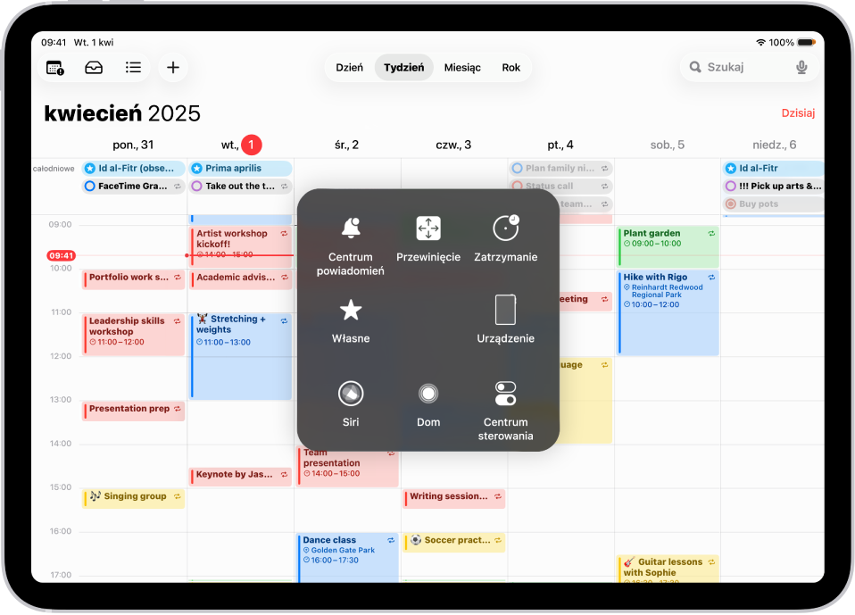 iPad z wyświetlonym menu funkcji AssistiveTouch, zawierającym narzędzia: Centrum powiadomień, Urządzenie, Centrum sterowania, Główny, Siri oraz Własne.