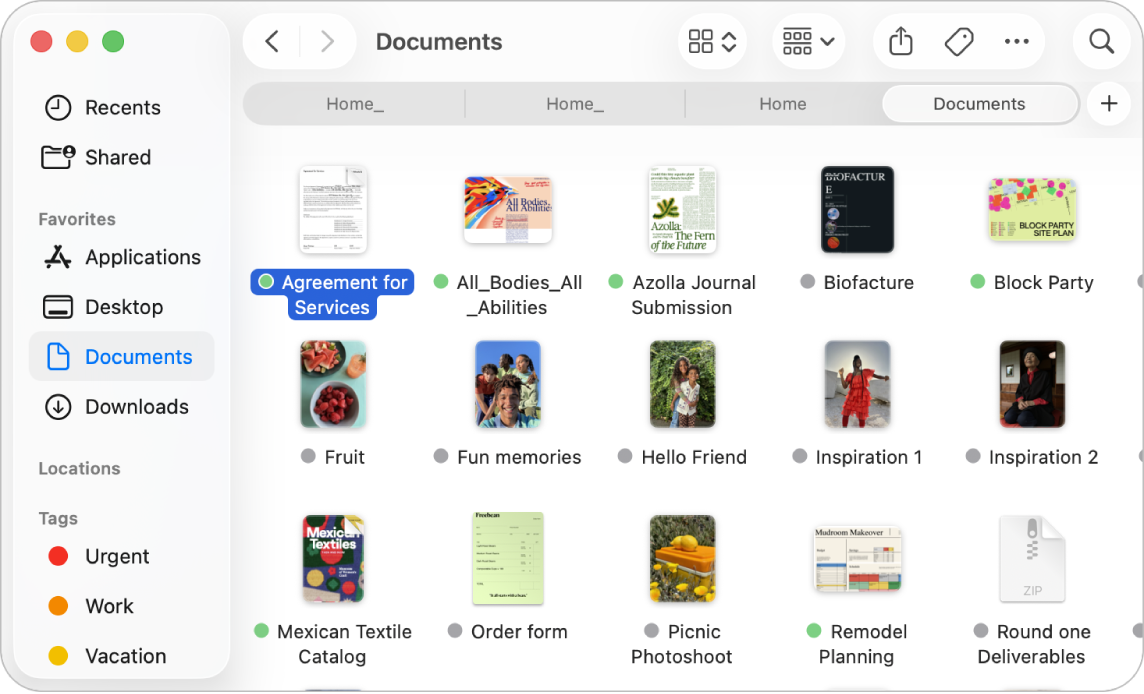 Tetingkap Finder dengan bar sisi Finder di sebelah kiri. Di bahagian atas tetingkap ialah empat butang yang menukar cara item ditunjukkan dalam tetingkap dan butang tambahan untuk mengatur dan berkongsi item.